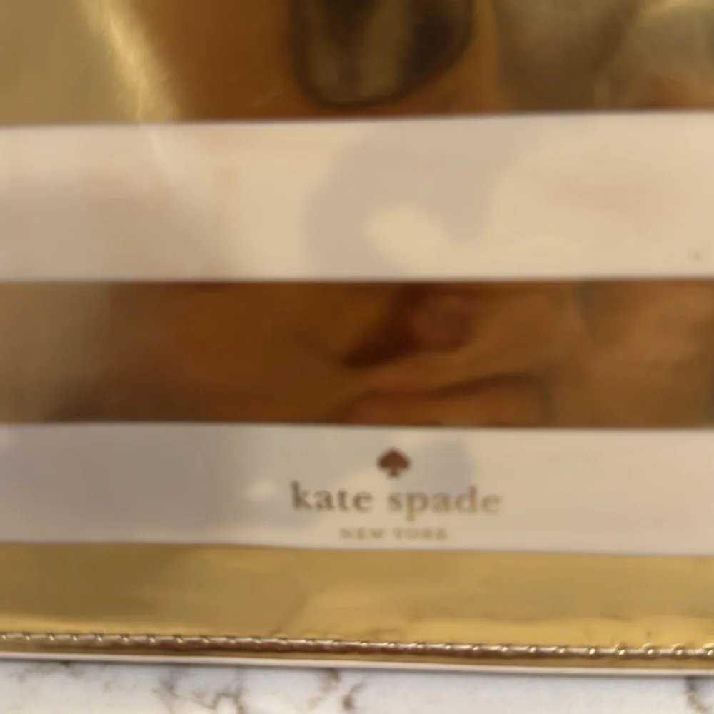 Kate Spade Gold and Cream Striped Clutch